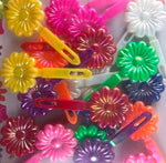 assorted color sunflower barrettes with sheen