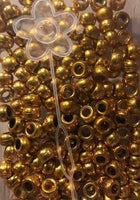 Gold hair beads, pony beads