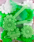 Shades of green flower snap barrettes