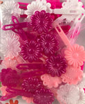 Shades of pink daisy barrettes
