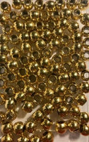 medium size gold hair beads