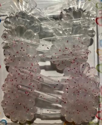 red and clear glitter flower barrettes