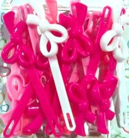 Shades of pink and white ribbon barrettes